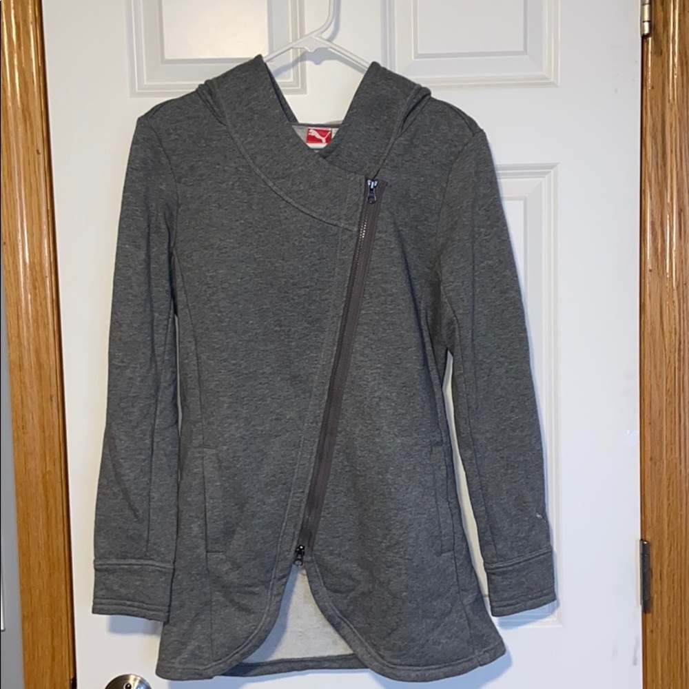 A grey puma jacket